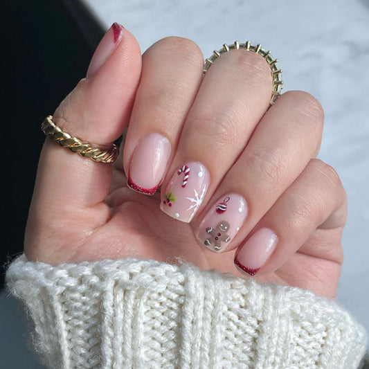 Cute Gingerbread Man and Candy Cane Christmas Nails